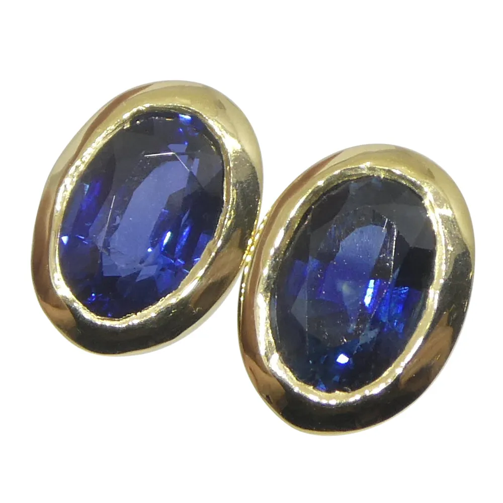 1.46ct Oval Blue Sapphire Stud Earrings set in 14k Yellow Gold