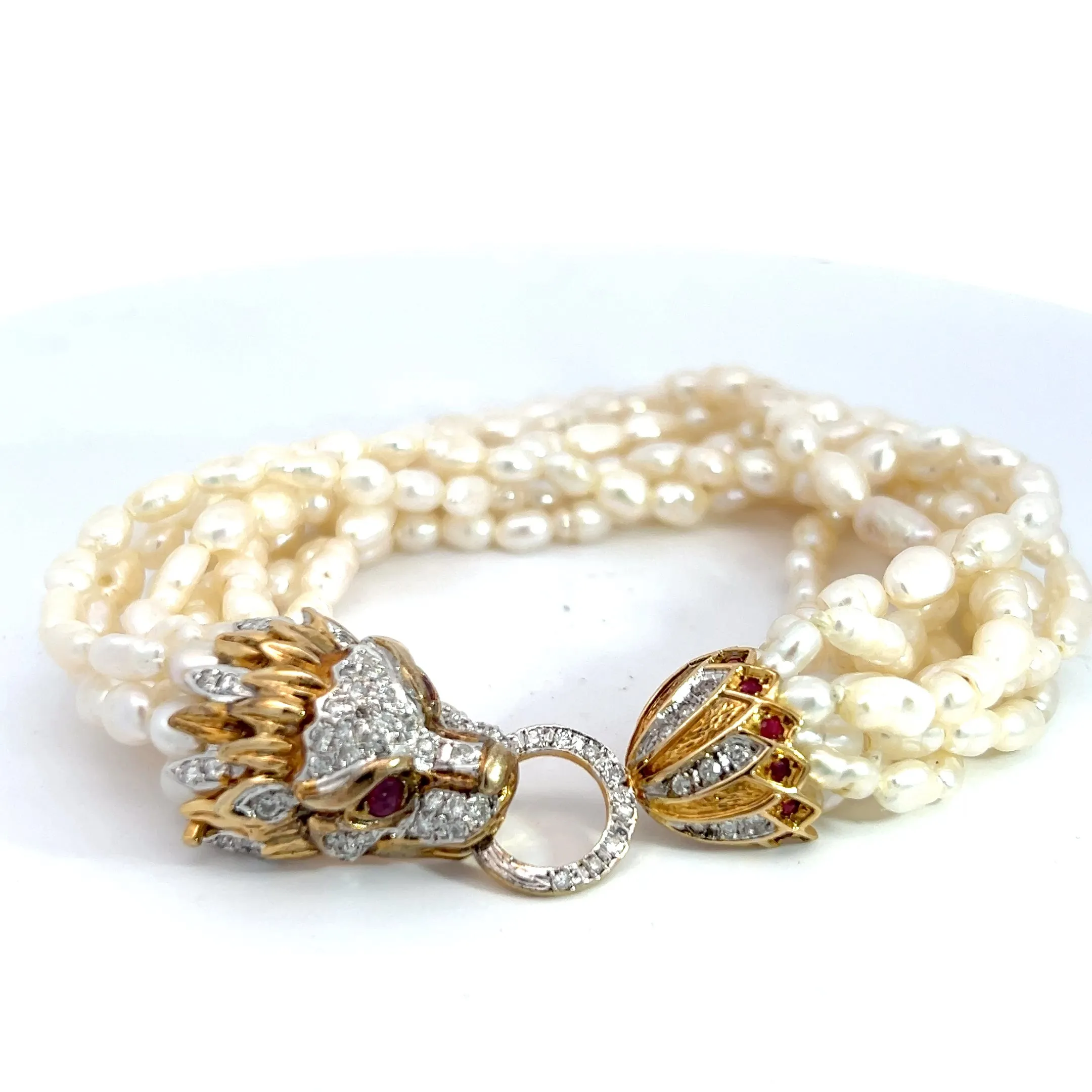 14k Yellow Gold .50ct G SI1 Round Diamond / .35ct Round Ruby and (8) Strand Pearl Dragon Lock Bracelet