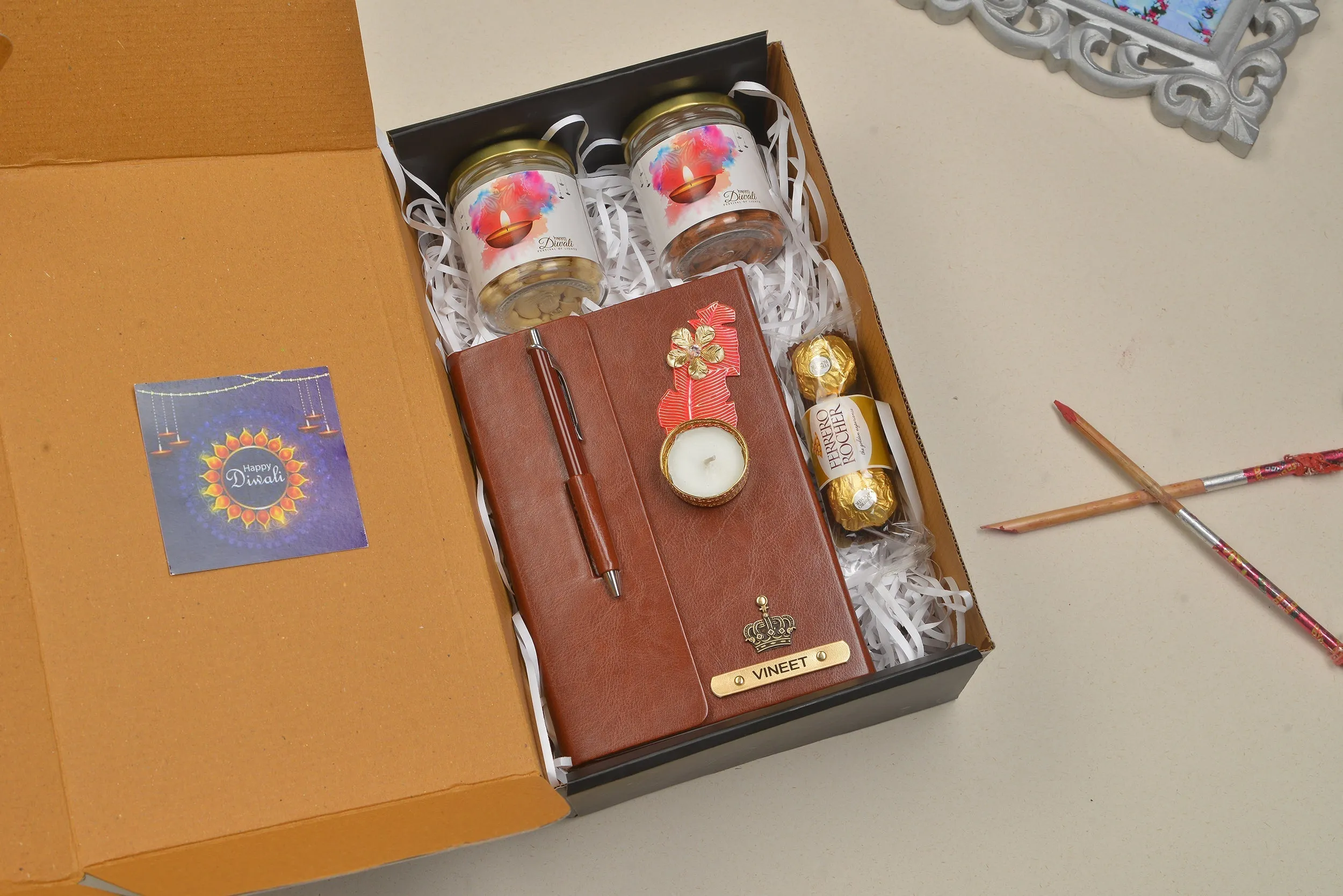 2024 Diwali Combo 4.0 (Diary with Pen   Classy Metal Keychain   Ferrero Rocher   Diya   Dryfruit Jar) - Brown