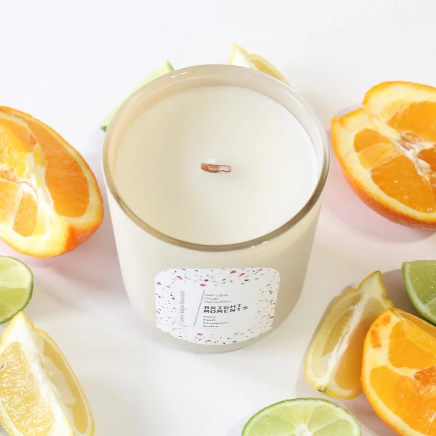 BRIGHT MOMENTS Hand Poured Candle. Yuzu. Basil. Bergamot. Odor Neutralizing Candle. Wood Wick. 12 oz. Matte Cream.