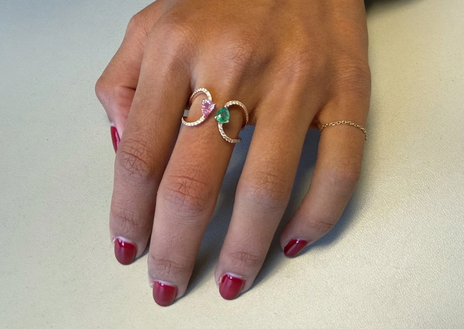Ring 18kt Rose Gold Open Pear Emerald and Sapphire with Diamonds