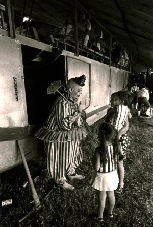 Untitled [Clown greeting kids]
