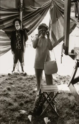 Untitled [Woman and clown in tent]